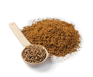 Kreuzkümmel-Früchte und -Pulver